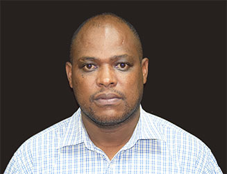 Dr. Naiman E. Shililiandumi